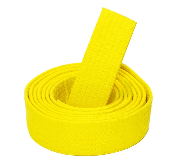 Cinturón amarillo de karate enrollado —  Fotos de Stock