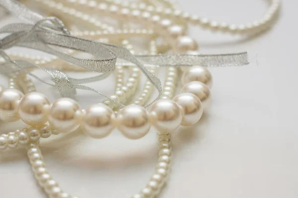 Cultured pearls on white — Stock Photo, Image