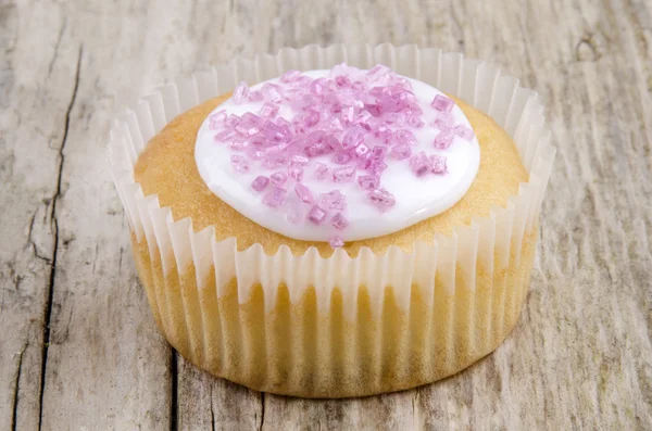 Home made cup cake with pink shimmer sugar — Stock Photo, Image
