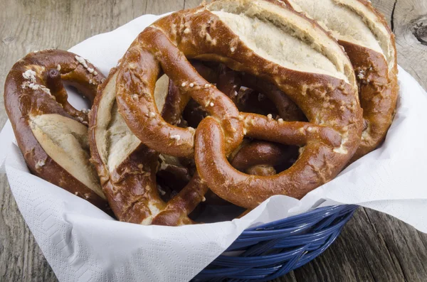 Salted pretzels in a blue basket — Stock Photo, Image