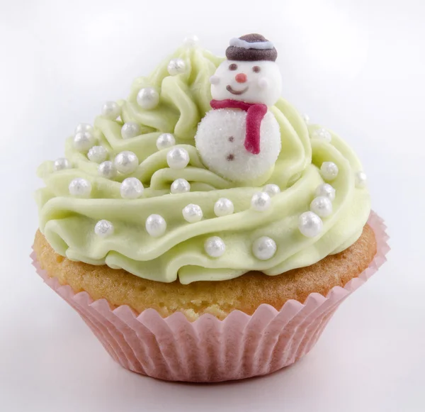 Cupcake com creme de manteiga verde claro — Fotografia de Stock
