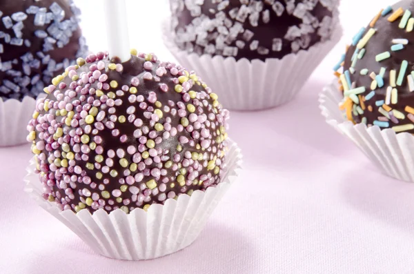 Cake pop with coloured sprinkles — Stock Photo, Image