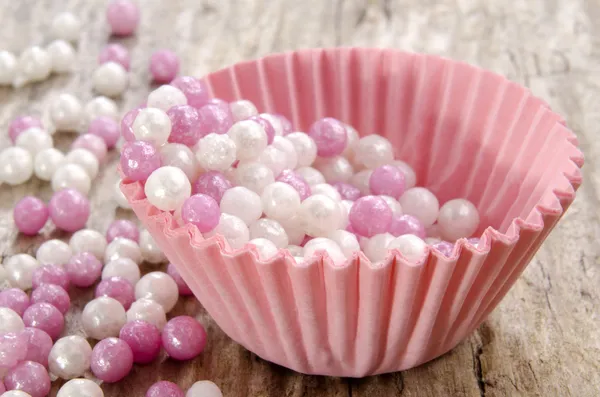 Mini rosa Cupcake-Etui mit Perlen — Stockfoto