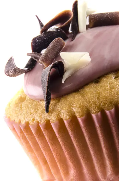 Cupcake avec glaçage et boucles de chocolat — Photo