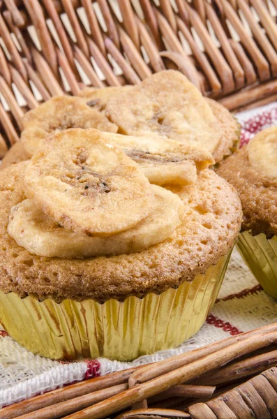 Cupcake with dried banana slices — Stock Photo, Image