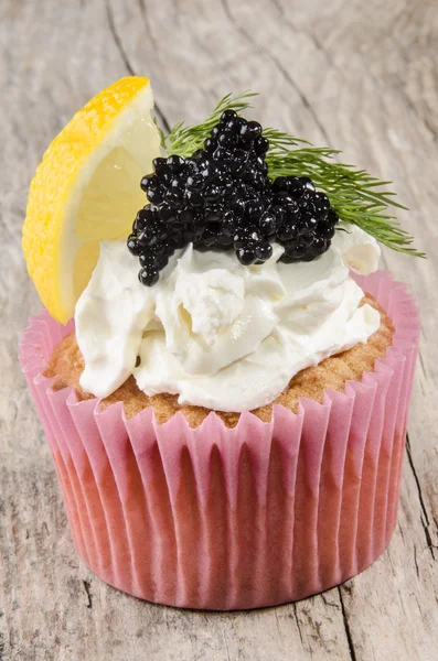 Cupcake with caviar, softcheese, dill and lemon — Stock Photo, Image