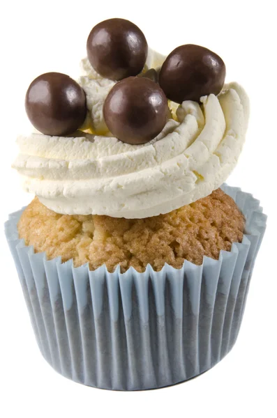 Cupcake com creme duplo e bola de chocolate — Fotografia de Stock