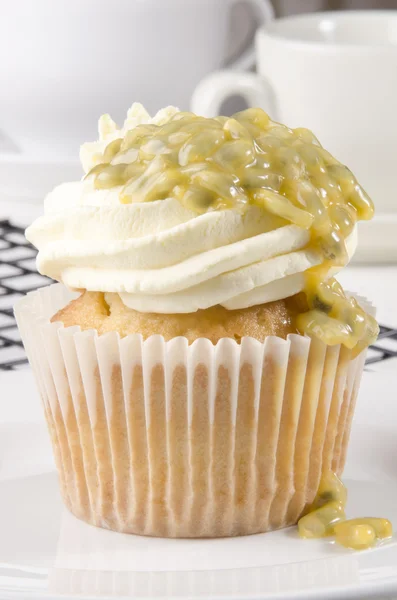 Vanilla cupcake with passion fruit — Stock Photo, Image