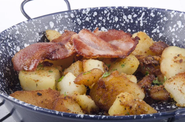 Roasted potatoes with bacon — Stock Photo, Image