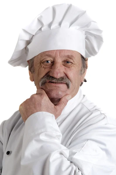 Starszy kucharz w białym mundurze pracy — Zdjęcie stockowe
