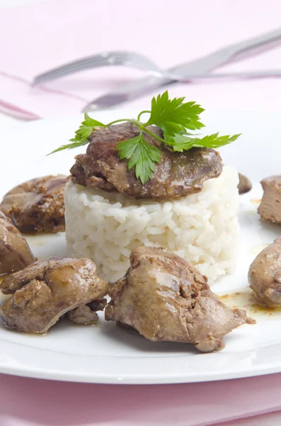 Chicken liver on rice with parsley — Stock Photo, Image
