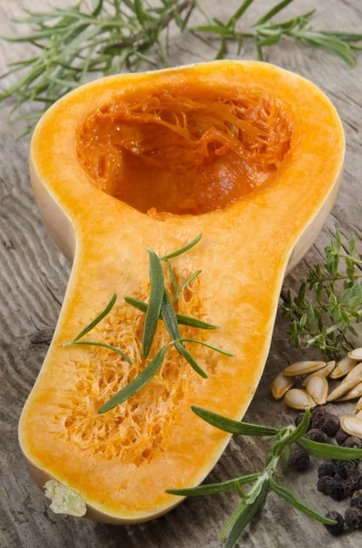 Half butternut pumpkin with spices — Stock Photo, Image