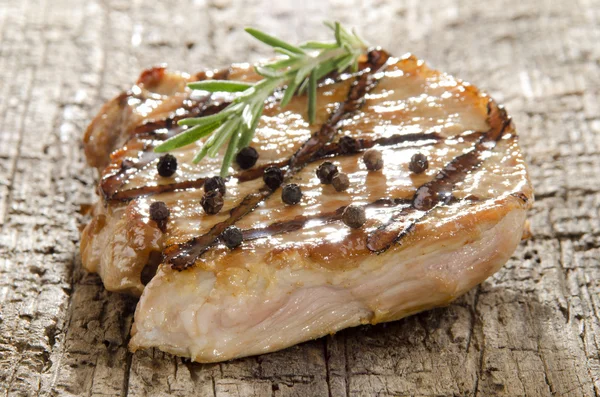 Grilled pork chop with peppercorns — Stock Photo, Image