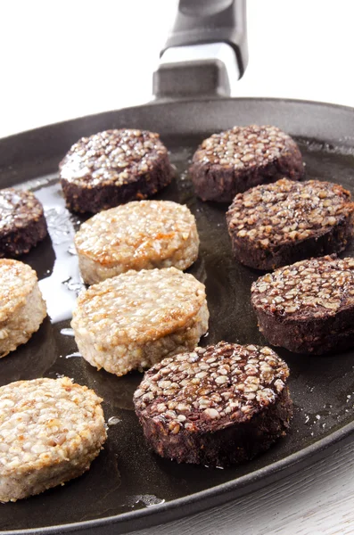 Black and white pudding on a pan — Stock Photo, Image