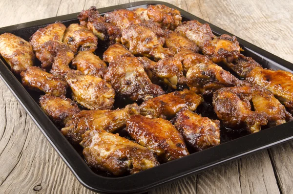 Gebakken kippenvleugels uit de oven — Stockfoto