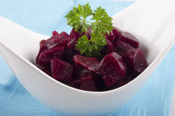 Diced beetroot and parsley in a bowl — Stock Photo, Image