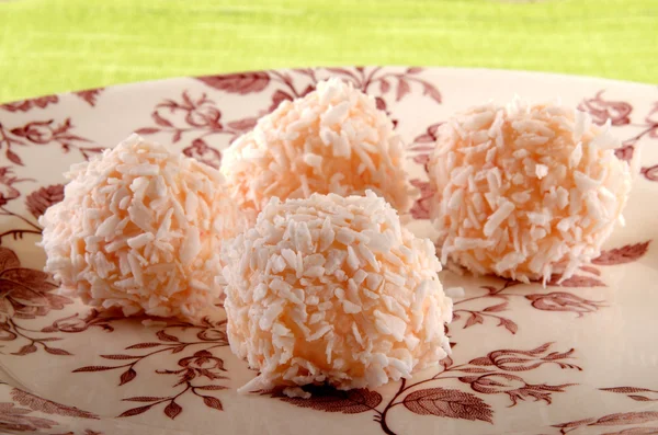Strawberry champagne truffle with coconut flakes — Stock Photo, Image