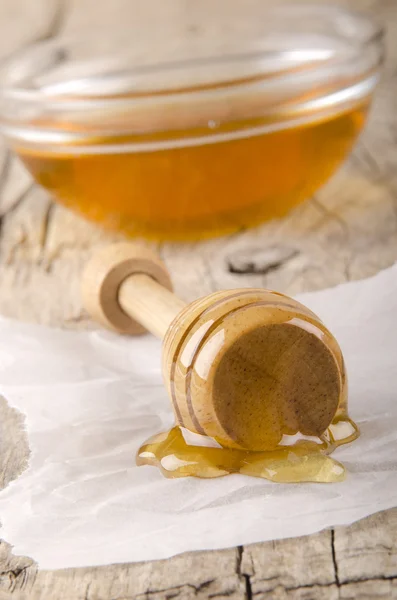 Honey dripper with some bee honey — Stock Photo, Image