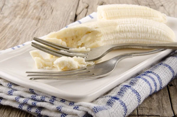 Mashed banana on a plate — Stock Photo, Image