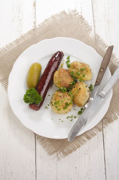 Oven baked potato with hungarian kolbasz — Stock Photo, Image
