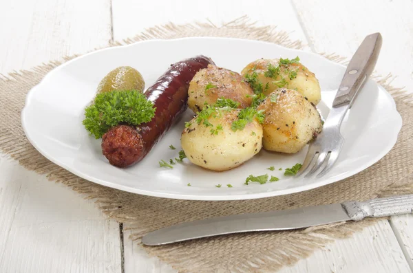Oven baked potato with hungarian kolbasz — Stock Photo, Image