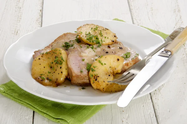 Grilled pork chops and apple slices — Stock Photo, Image