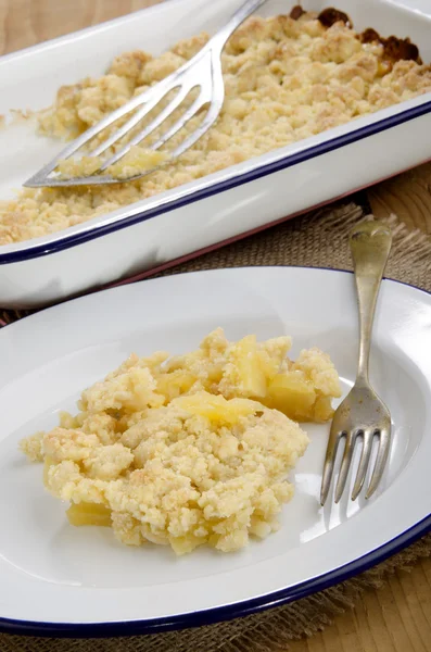 Baked apple crumble on a plate — Stock Photo, Image