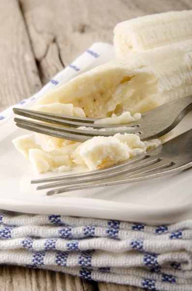 Mashed banana on a plate — Stock Photo, Image