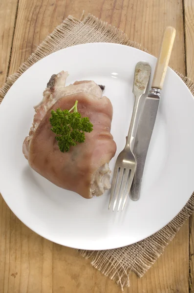 Cooked pork knuckle on a plate — Stock Photo, Image