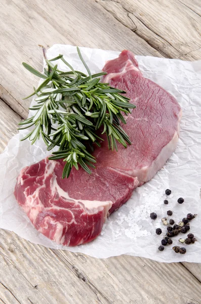 Beef sirloin steak with rosemary — Stock Photo, Image