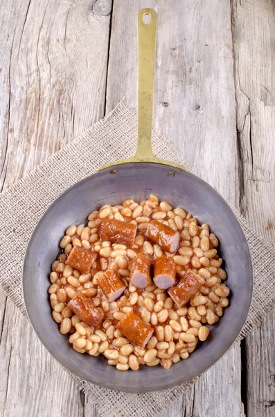 Baked bean and sausage in a pan — Stock Photo, Image