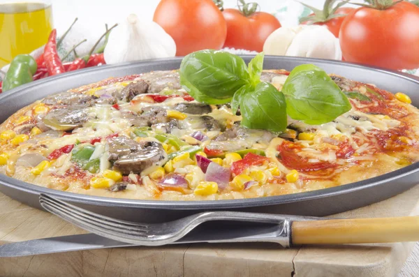 Vegetarian pizza in a tray — Stock Photo, Image