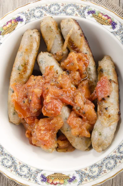 Salsichas picantes italianas com tomate — Fotografia de Stock