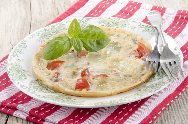 Mediterranean omelette in on a plate — Stock Photo, Image