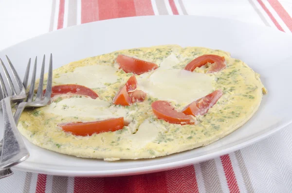 Omlette with mozzarella and tomato — Stock Photo, Image