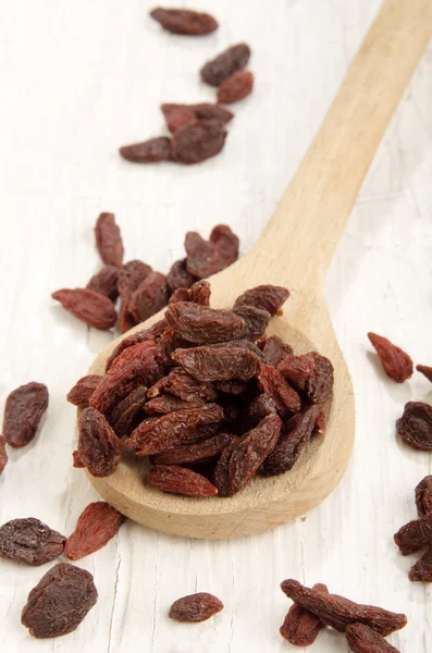 Goji berry on a wooden spoon — Stock Photo, Image