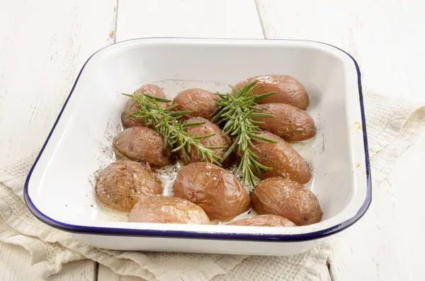 Oven baked potato with rosemary — Stock Photo, Image