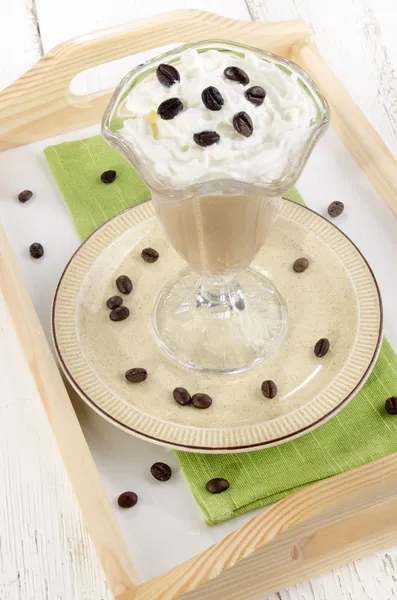 Cold ice coffee in a glass on a tray — Stock Photo, Image