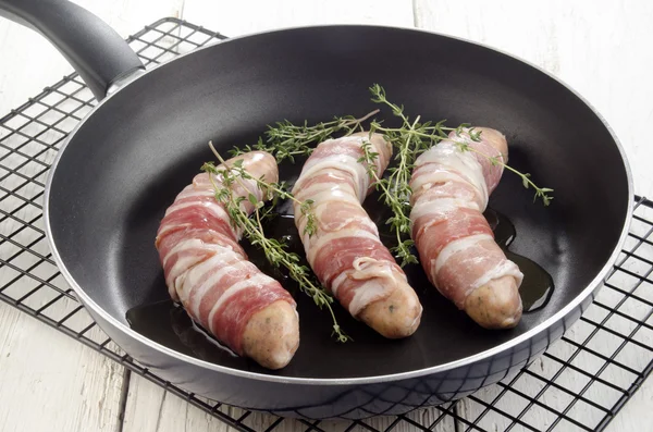 Grill sausage with herbs in natural casing — Stock Photo, Image