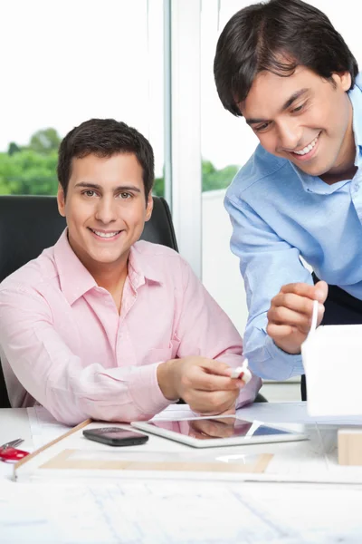 Happy Architects Working Together Stock Image