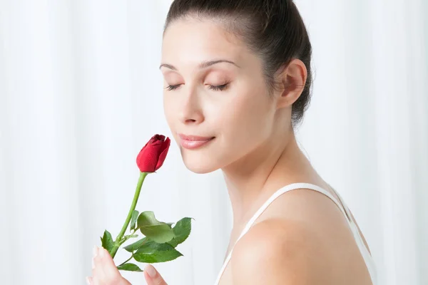 Young Woman with a Rose Royalty Free Stock Photos