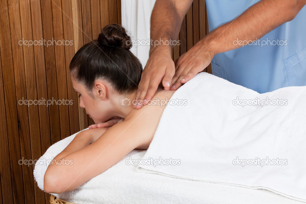 Woman Receiving a Back Massage