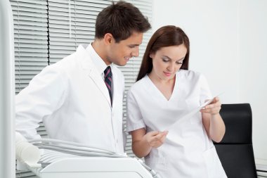 diş hekimi ve diş raporu ile Yardımcısı