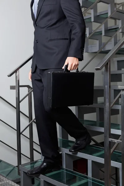 Low Section Of Businessman Descending Stairs — Stock Photo, Image