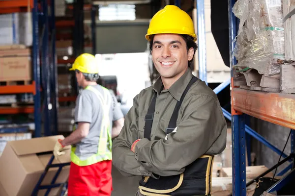 Young Foreman With Arms Crossed At Warehouse — Stock Photo, Image