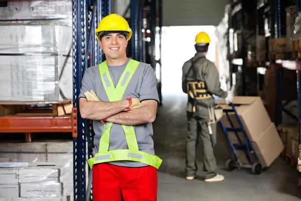 Mid Adult Foreman With Arms Crossed At Warehouse — Stock Photo, Image
