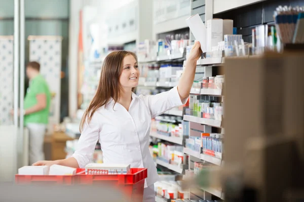 Pharmacist Stocking Shelves — Stock Photo, Image