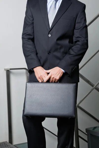 Midsection Of Young Businessman Carrying Briefcase — Stock Photo, Image