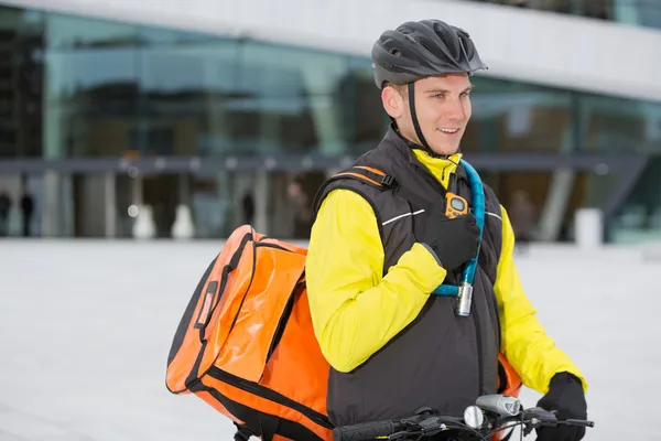 Male Cyclist With Courier Delivery Bag Using Walkie-Talkie — Stock Photo, Image