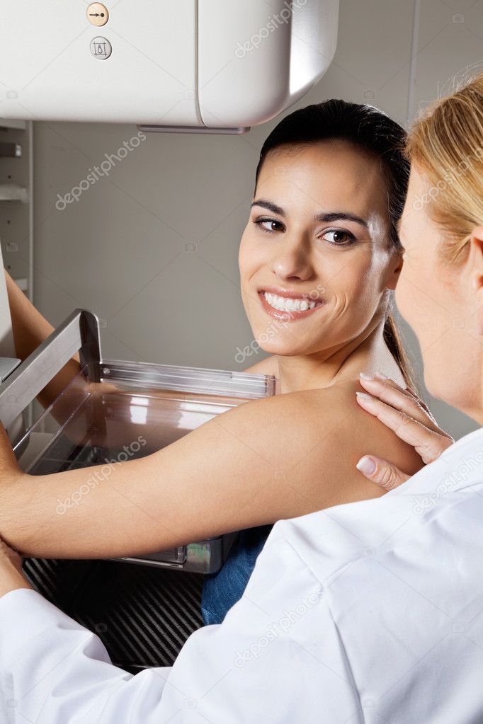 Young Female Patient Undergoing Mammogram X-ray Test